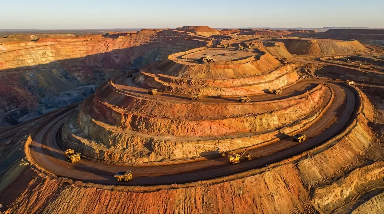 Open pit mining operation with heavy machinery