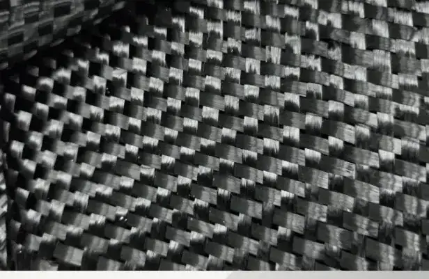 Close-up of woven carbon fiber fabric